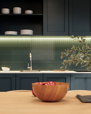 Modern luxury kitchen with dark colors and forest green tile backsplash