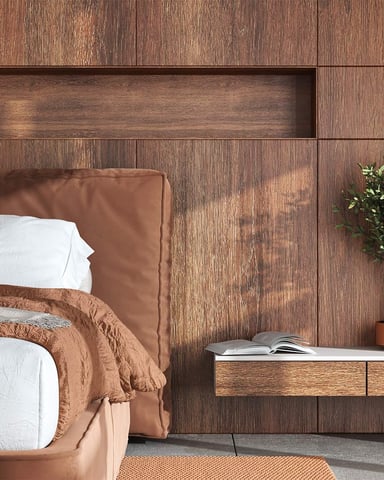 Modern bedroom with wooden detailing and burnt orange color palette