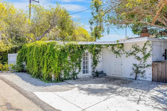 Vine-Covered Garden Suite | Queen + Patio - Image 1